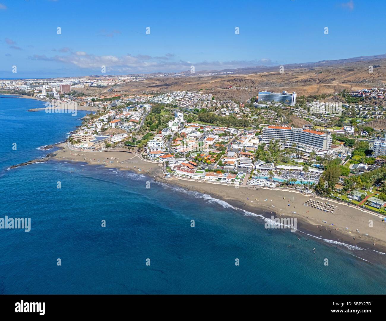 Gran Canaria, Canary Islands, Spain. 8th July 2025. Aerial image of Playa Del Ingles and Playa De San Augustin coastline at Maspalomas. Stock Photo