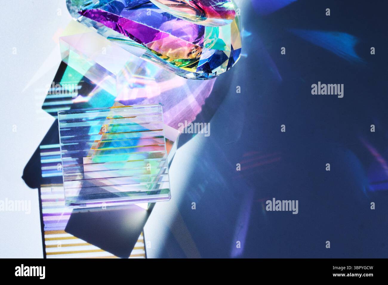 Colorful Reflections. Geometric prisms casting vibrant, multicolored shadows Stock Photo