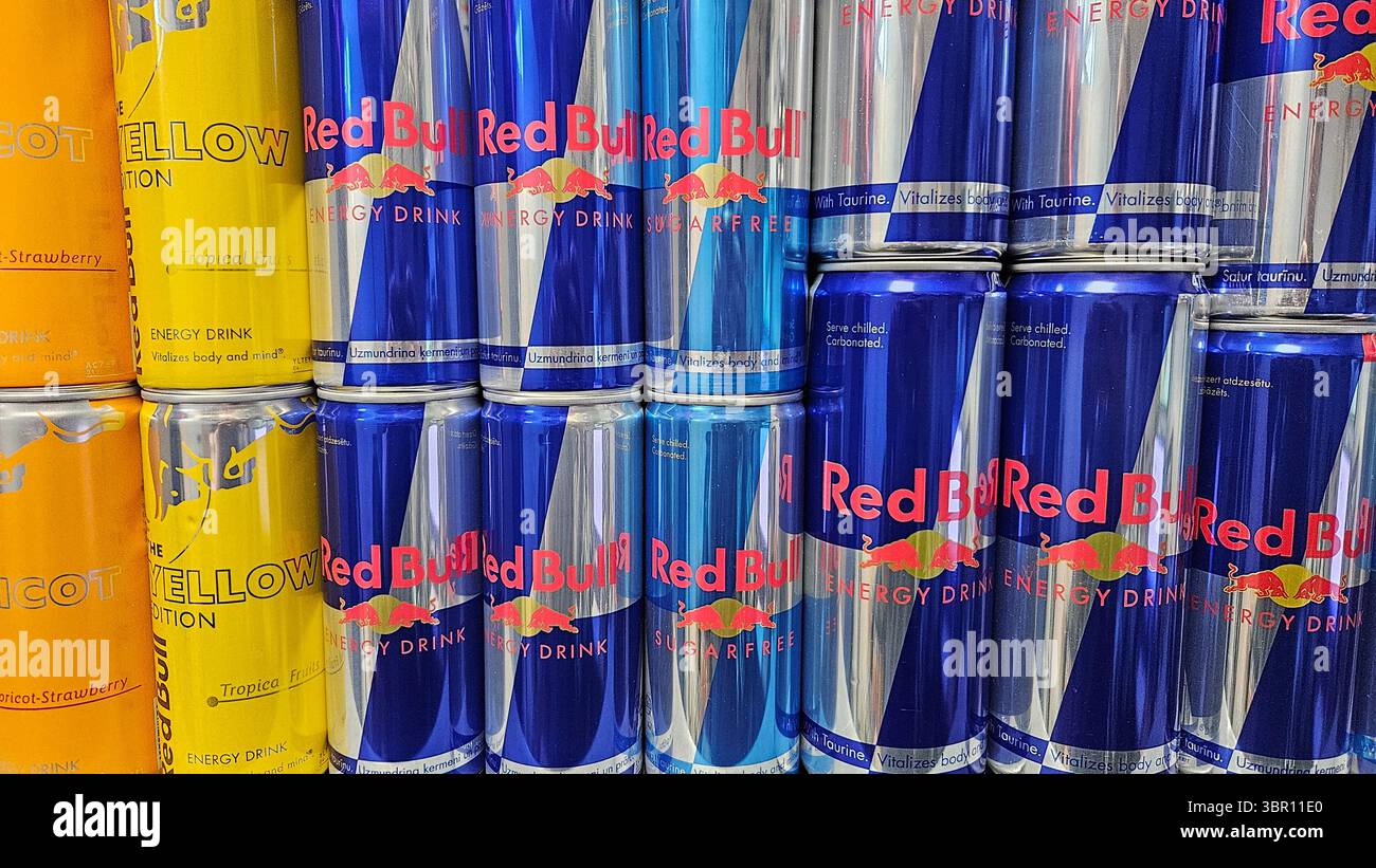 Close-Up of Red Bull Energy Drink Cans in Store Display.Riga.Latvia.10.07.2025 - Smartphone Captured Stock Image