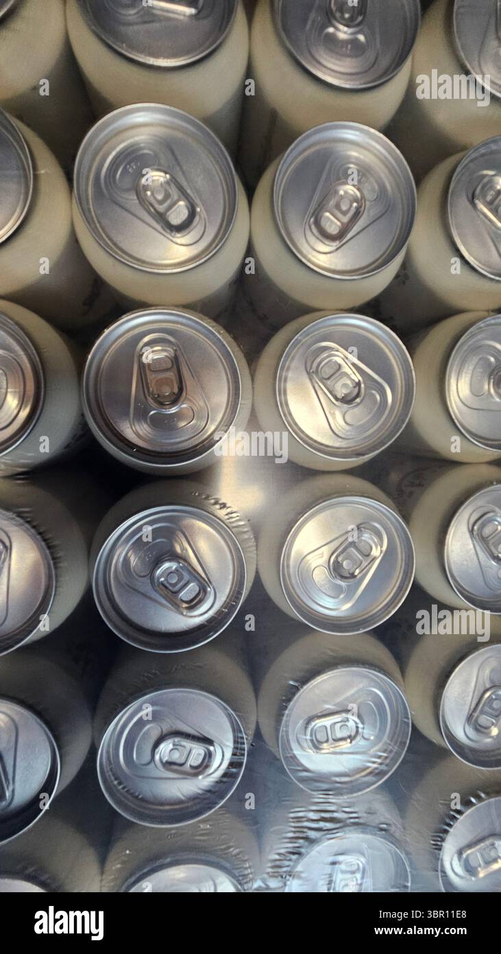Top View of Aluminum Cans in Plastic Wrap Packaging - Smartphone Captured Stock Image