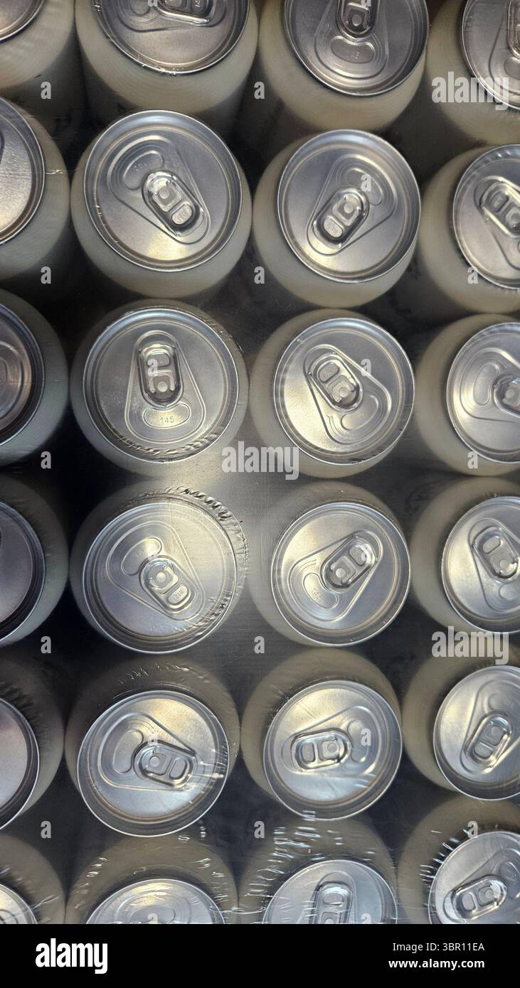 Top View of Aluminum Cans in Plastic Wrap Packaging - Smartphone Captured Stock Image