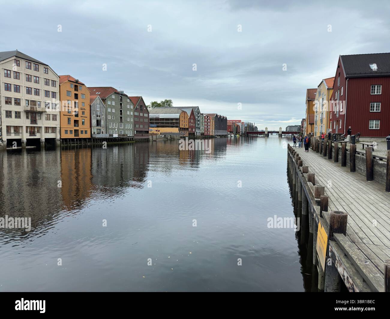 Picturesque view of colorful buildings along the Nidelva River in Trondheim, Norway. - Smartphone Captured Stock Image