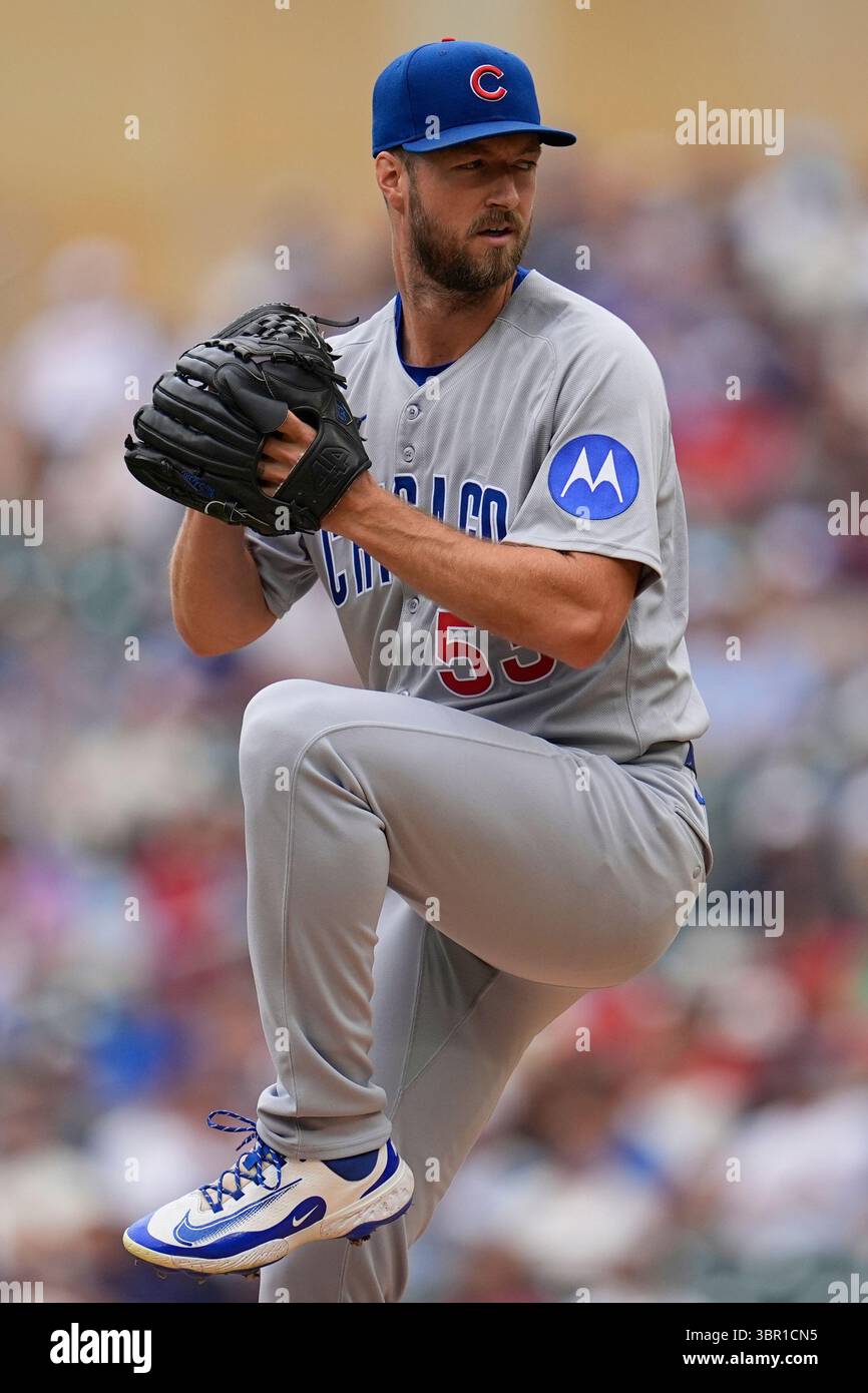 Chicago Cubs starting pitcher Colin Rea winds up to deliver during the ...