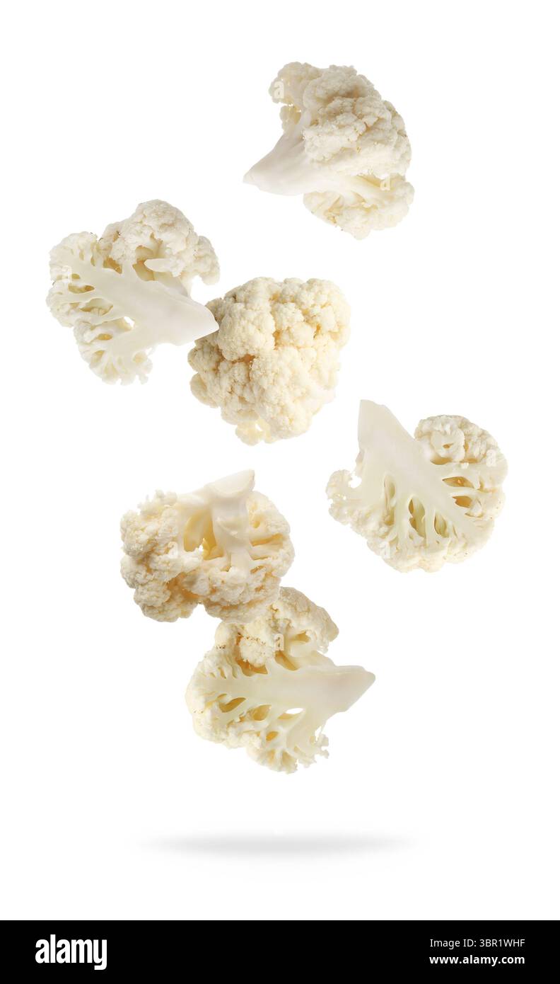 Fresh cauliflower florets falling on white background Stock Photo
