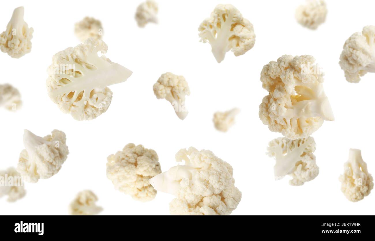 Fresh cauliflower florets falling on white background Stock Photo