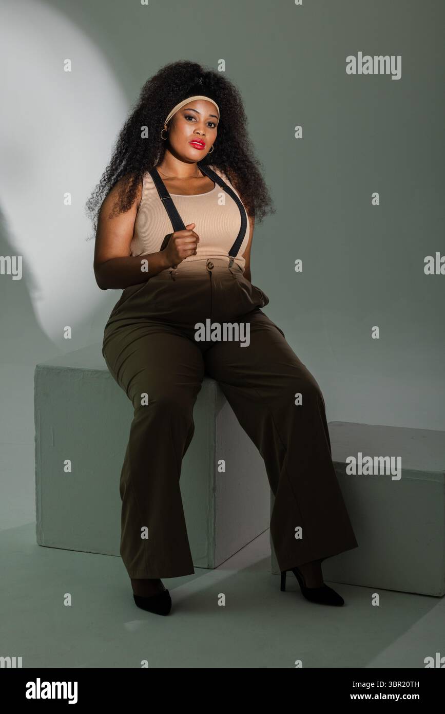 Female wearing beige top hi-res stock photography and images - Alamy
