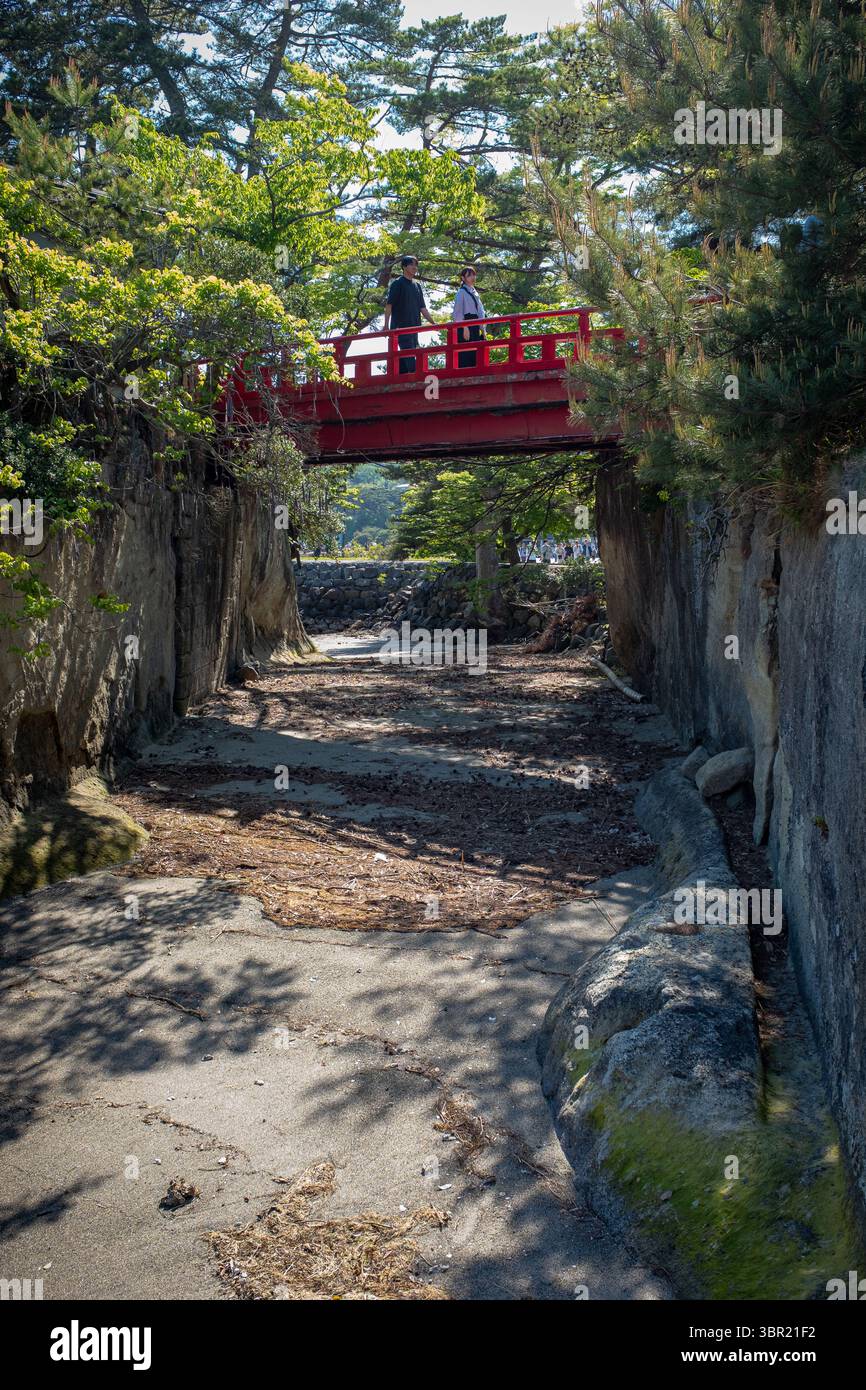 Japanese Bridge Springtime Matsushima, Japan - May 5, 2024: Barely recognizable man and woman ...