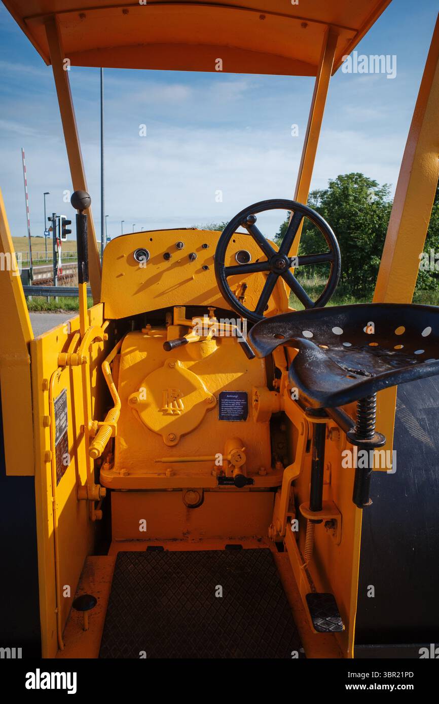 An old yellow historic levelling roller Stock Photo