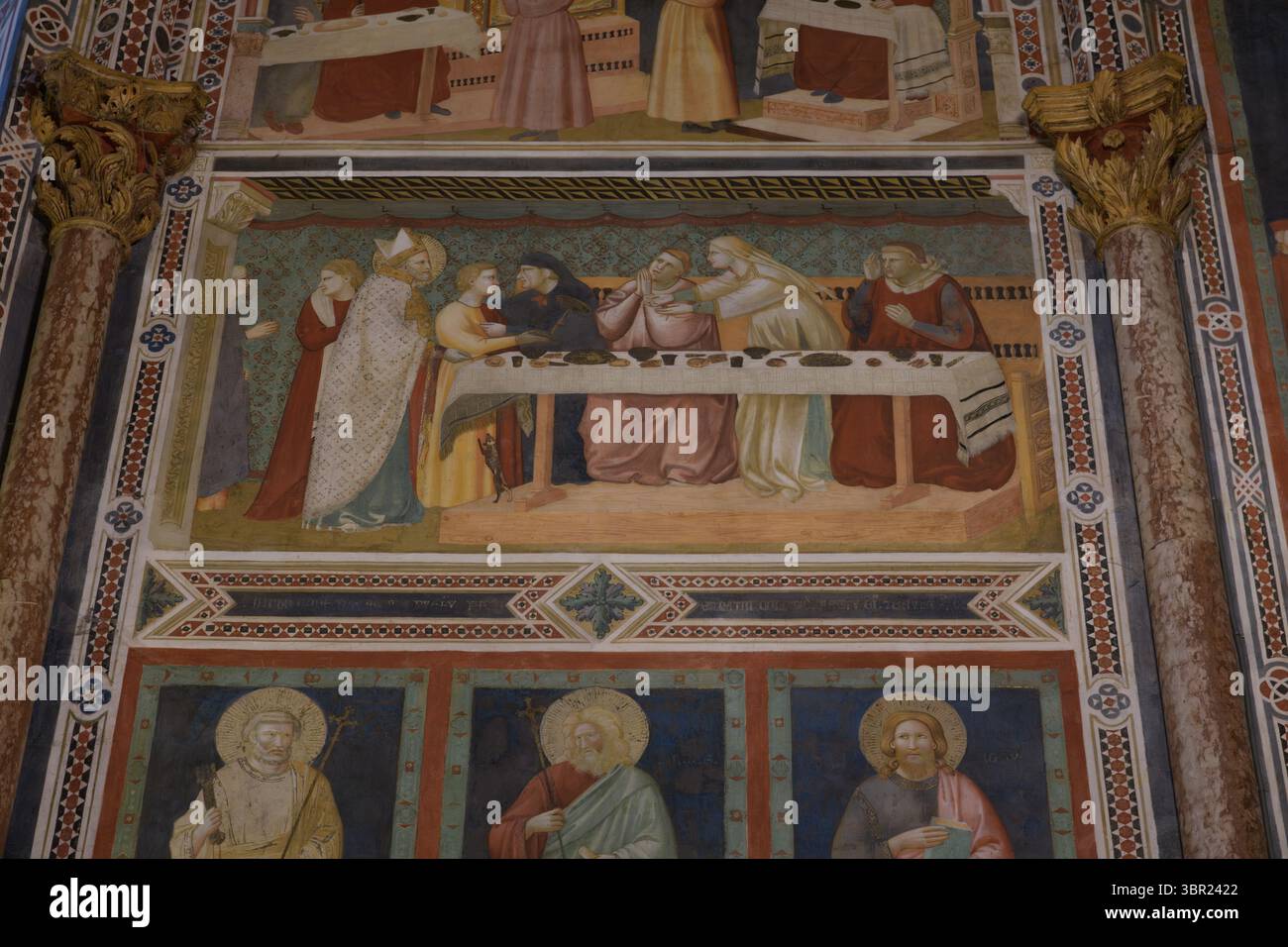 Fresco showing Saint Nicholas returning a boy to his family during the feast in his honor, Chapel of St Nicholas, Lower Church of San Francesco, Assis Stock Photo