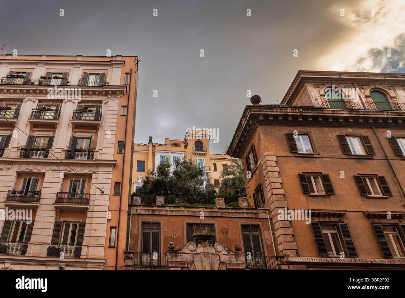Late-afternoon light washes italian facades of early-20th-century ...
