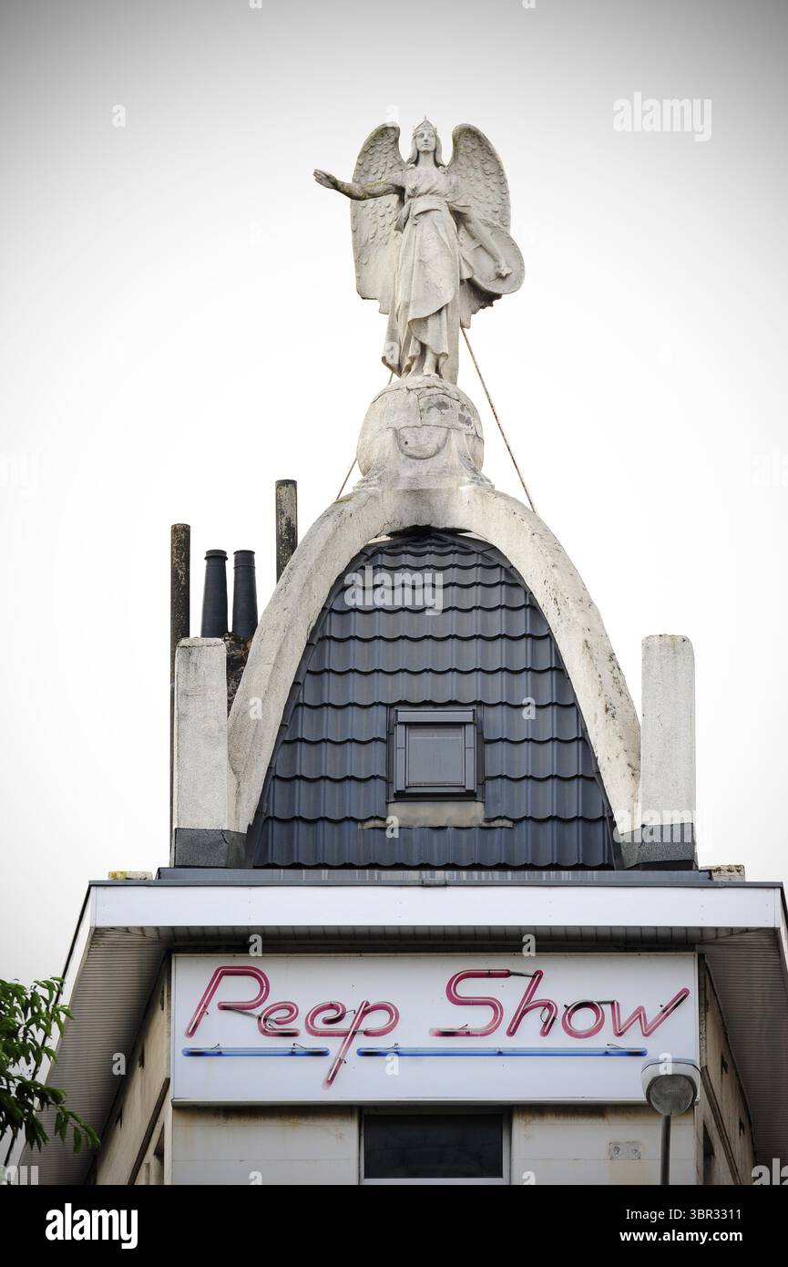 Angel, sculpture on a peep show building, red light district in Quartier Brabant, Brabantwijk, Brussels, Bruxelles, Brussel, Belgium Stock Photo