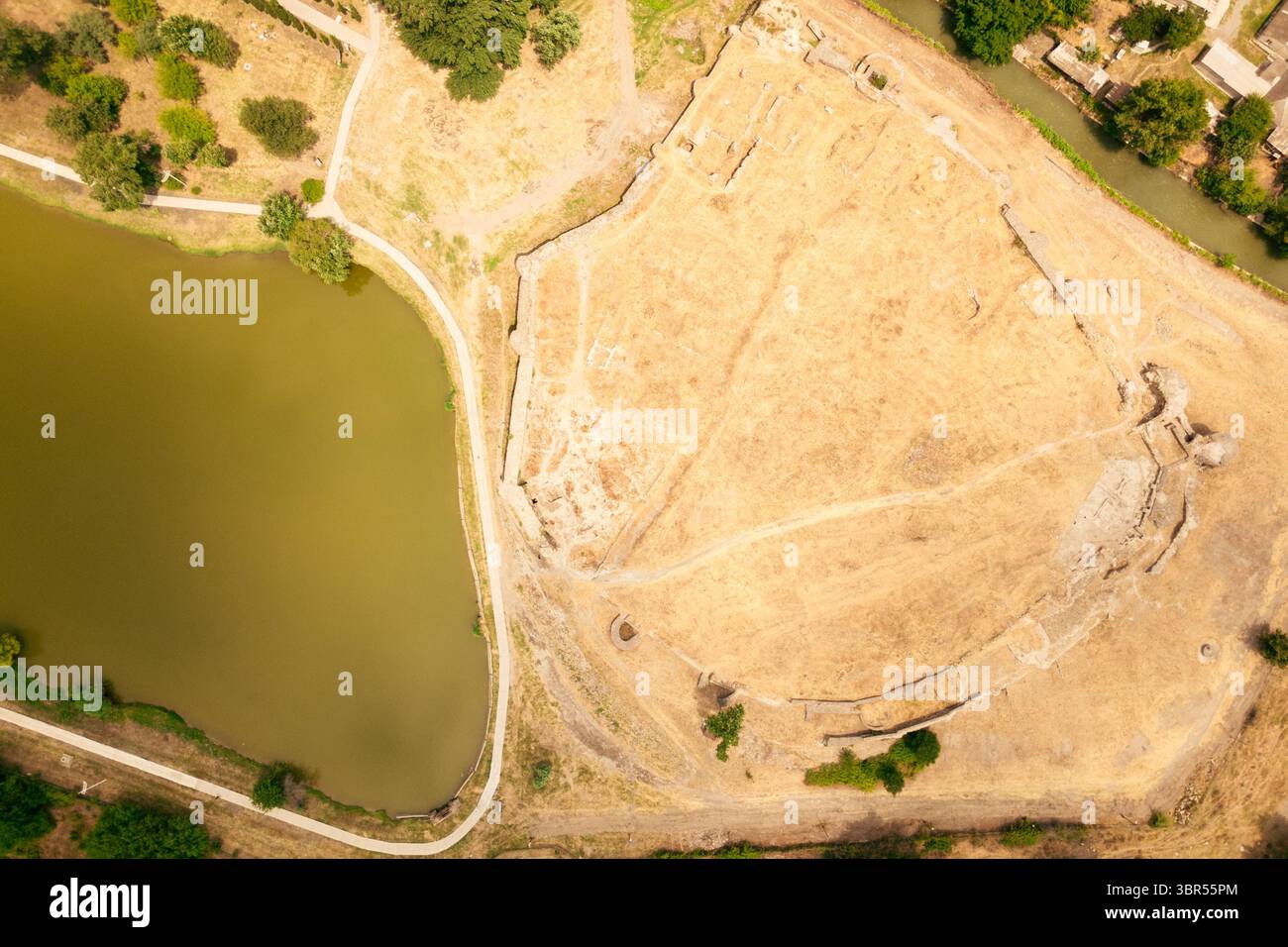 Aerial top down view of ancient Rustavi Fortress ruins near lake ...