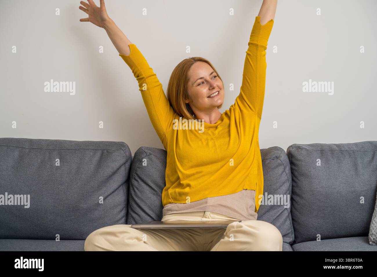 Successful woman. Cheerful, happy woman working from home Stock Photo