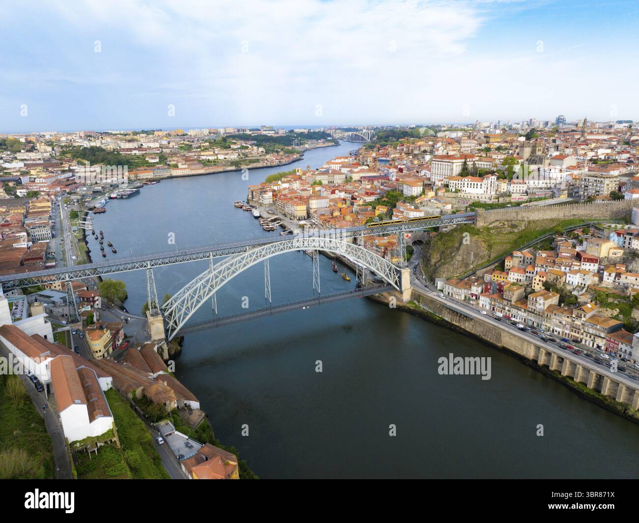 Aerial view of the Dom Luís I Bridge arches gracefully over the Douro ...