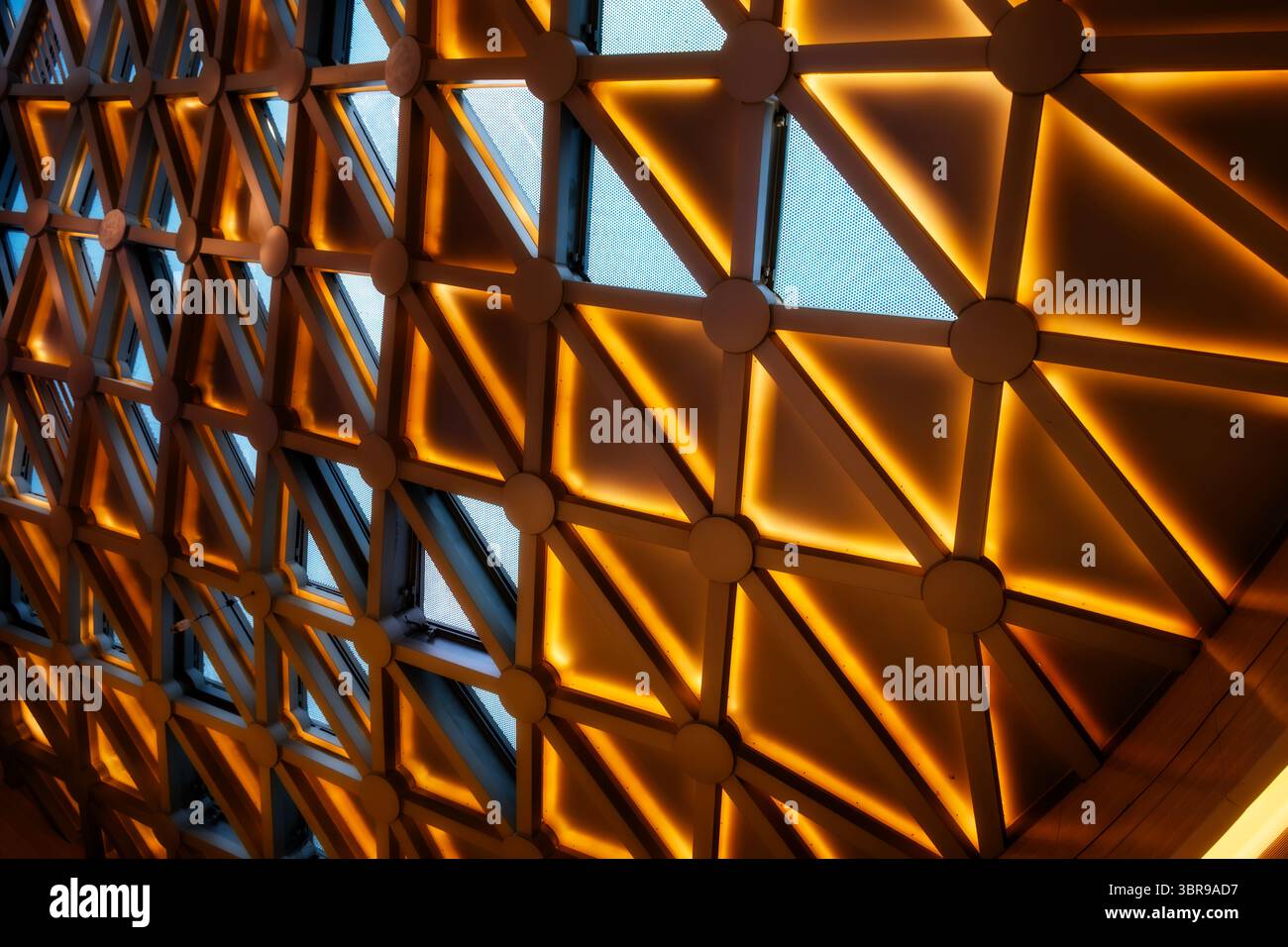 Architectural glass structure with a geometric triangular pattern ...