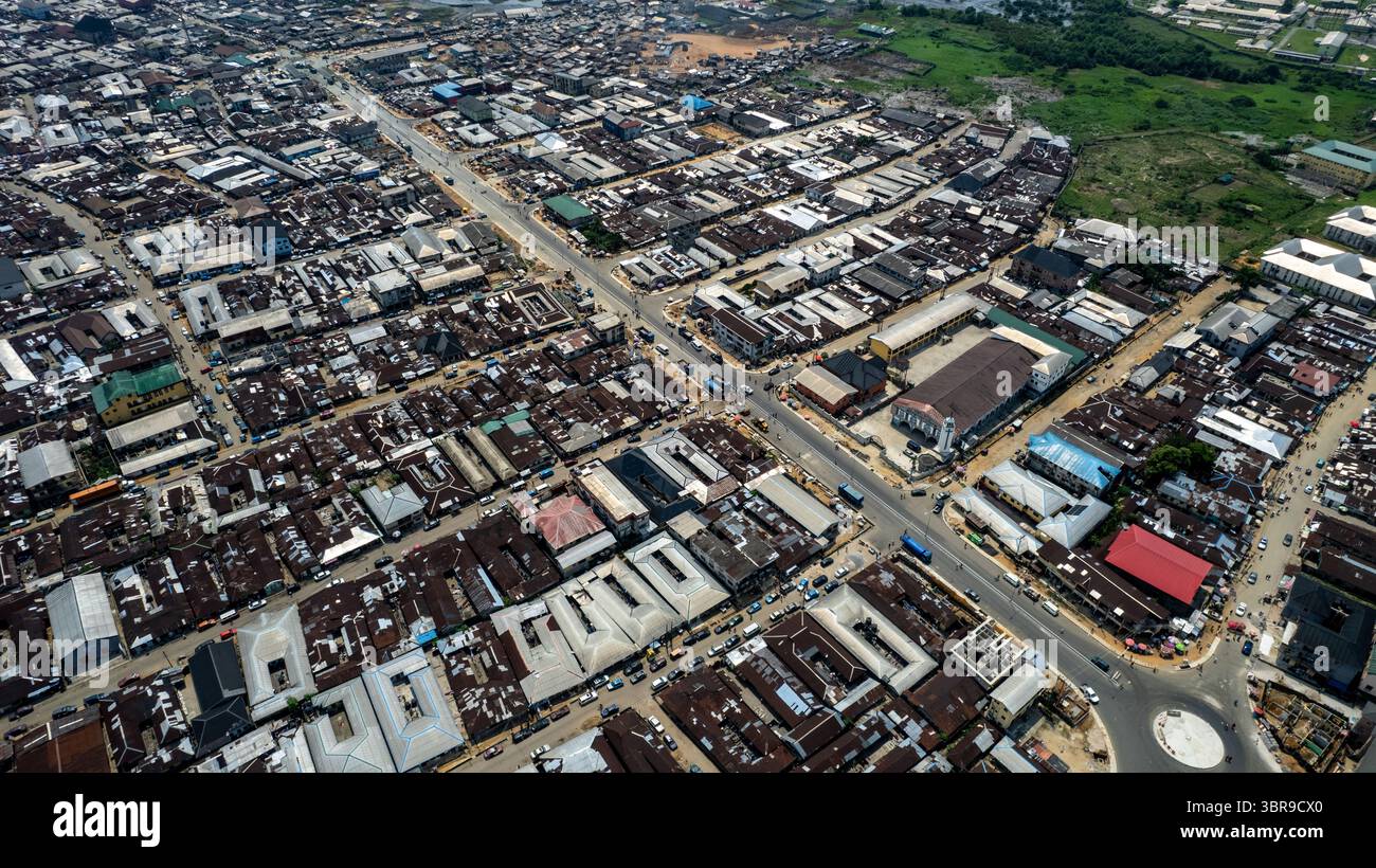 Aerial View Of A Sprawling Cityscape With Densely Packed Buildings And aerial-view-of-a-sprawling-cityscape-with-densely-packed-buildings-and