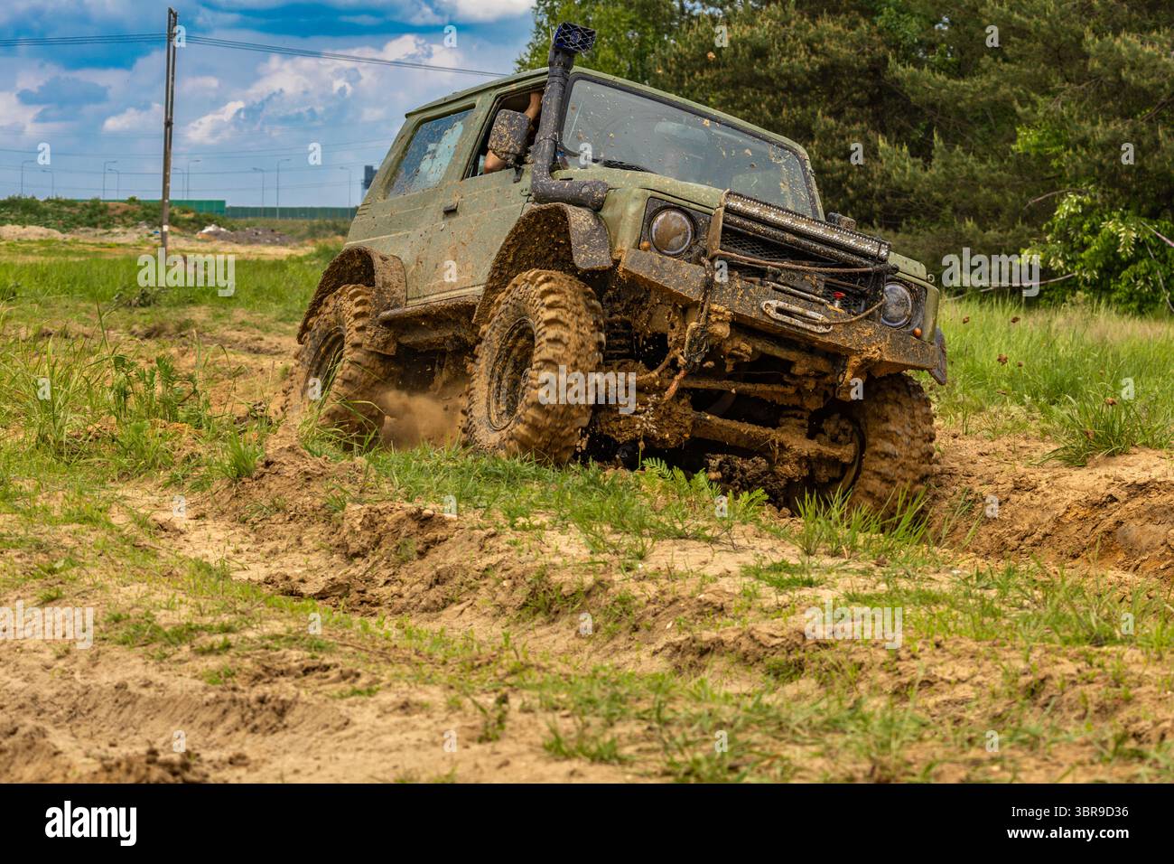 Off-road vehicle in difficult terrain, off-road car rally, off-road car races Stock Photo