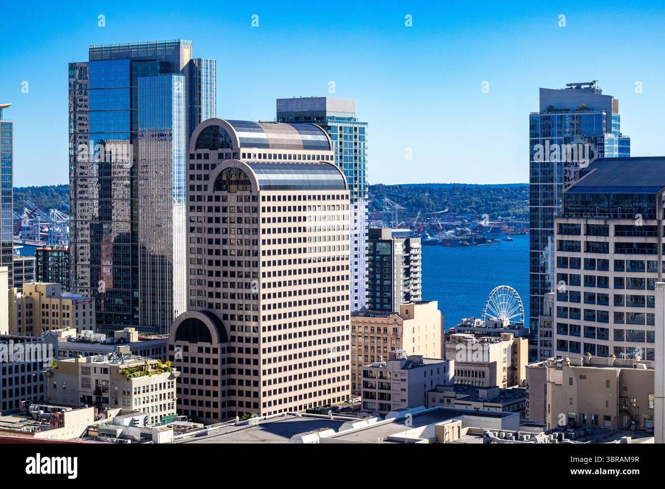 Aerial view of downtown Seattle, Washington, with the Century Square building and Seattle Great Wheel Ferris wheel on the Puget Sound Stock Photo