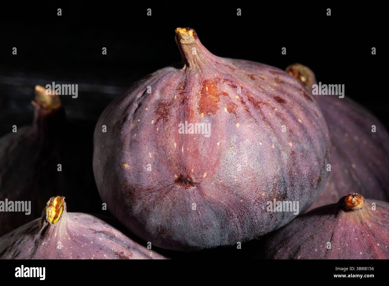 figs fruit on black background top view Stock Photo