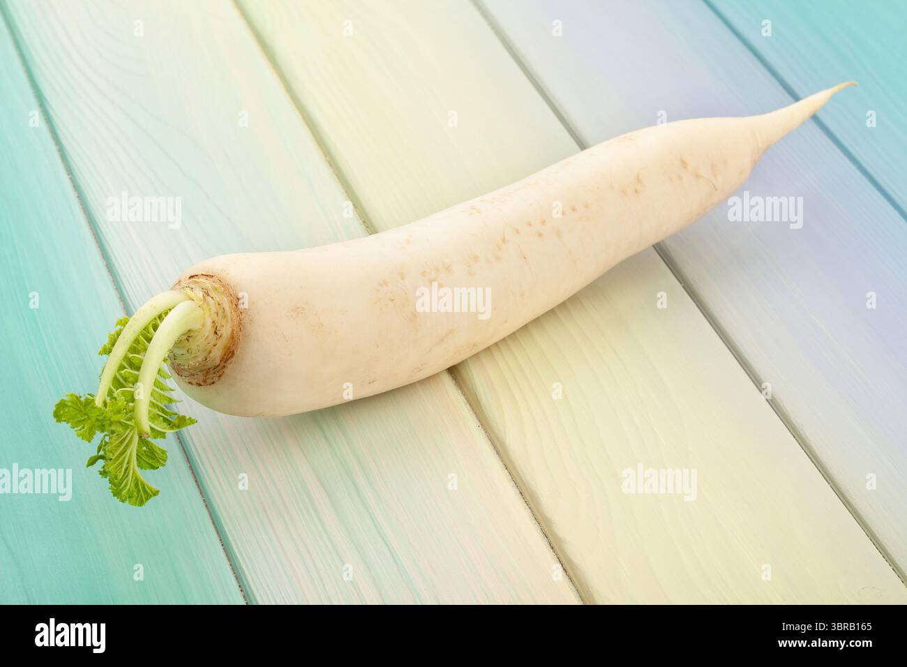 daikon radish on wood background Stock Photo