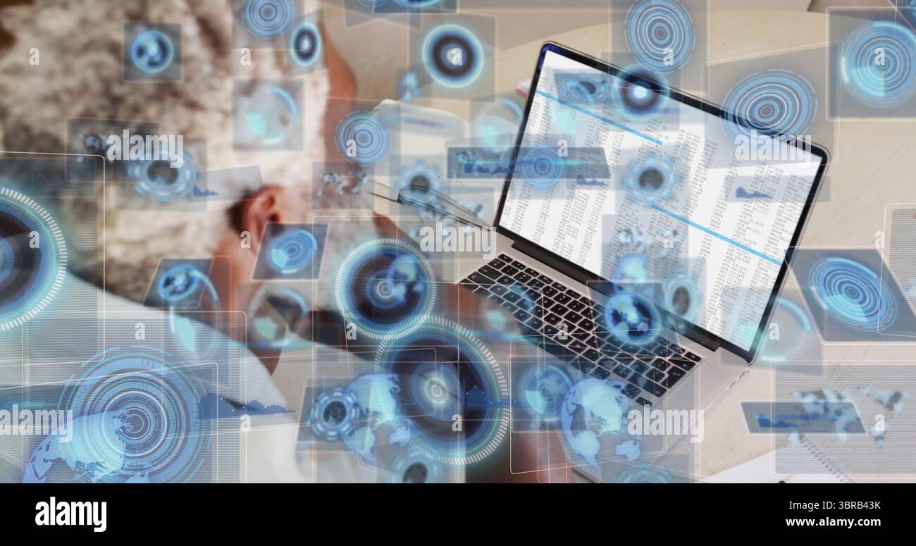 Leaning analyst analyzing spreadsheets on laptop at desk with UI graphics, copy space Stock Photo