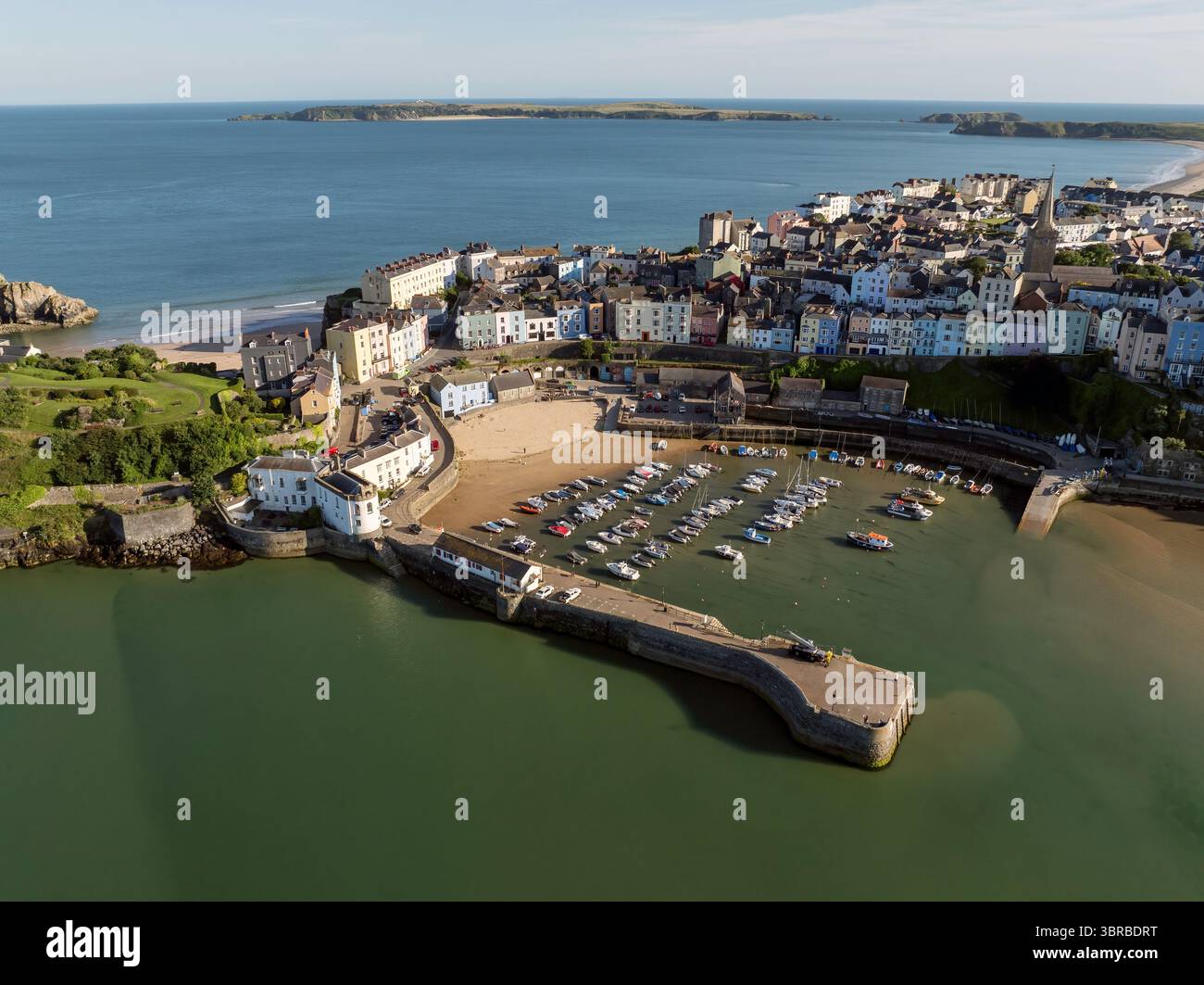 Editorial Tenby, UK - July 07, 2025: Drone view of Tenby Town and Calder Island in West Wales. Stock Photo