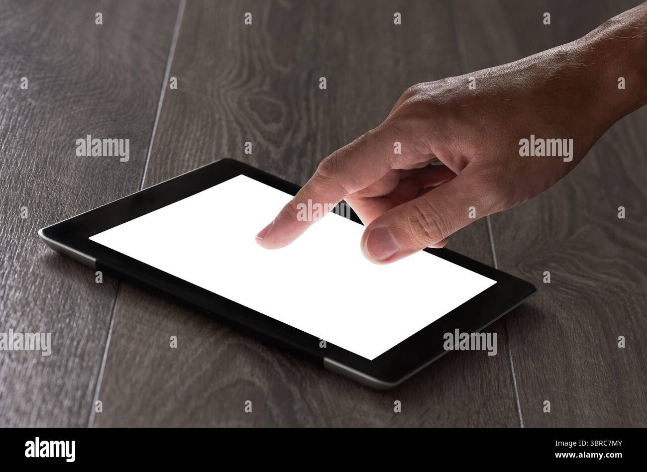 hand presses on screen digital tablet Stock Photo
