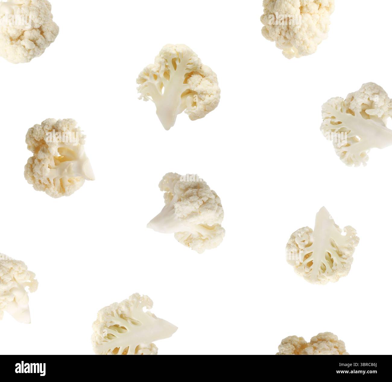Fresh cauliflower florets falling on white background Stock Photo
