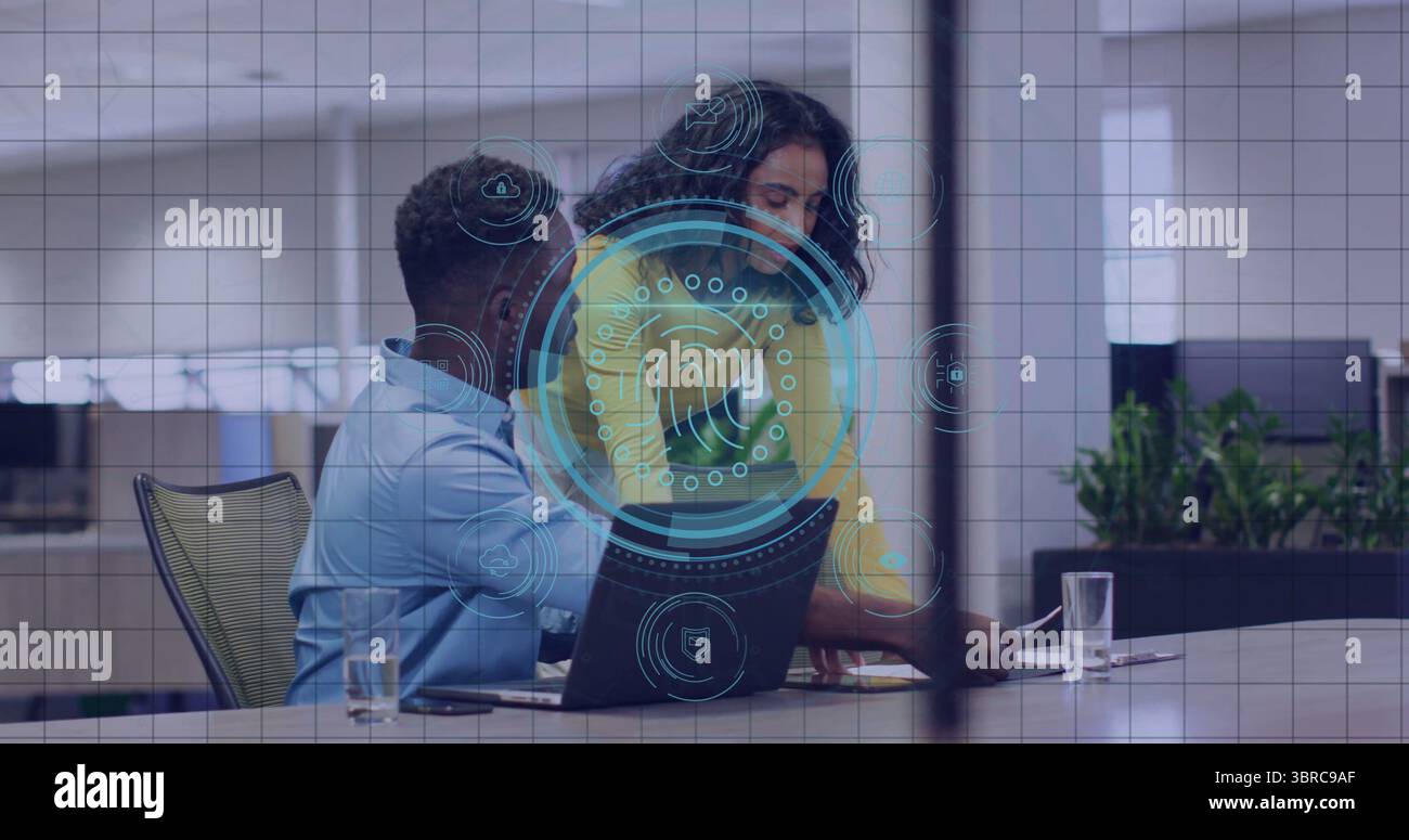 Leaning woman pointing and man examining biometric overlay on laptop at ...