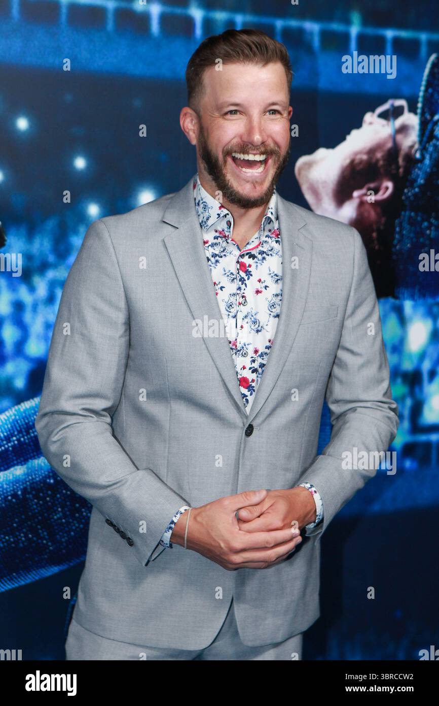Luke Jacobz arriving at the Rocketman premiere with Taron Egerton and ...