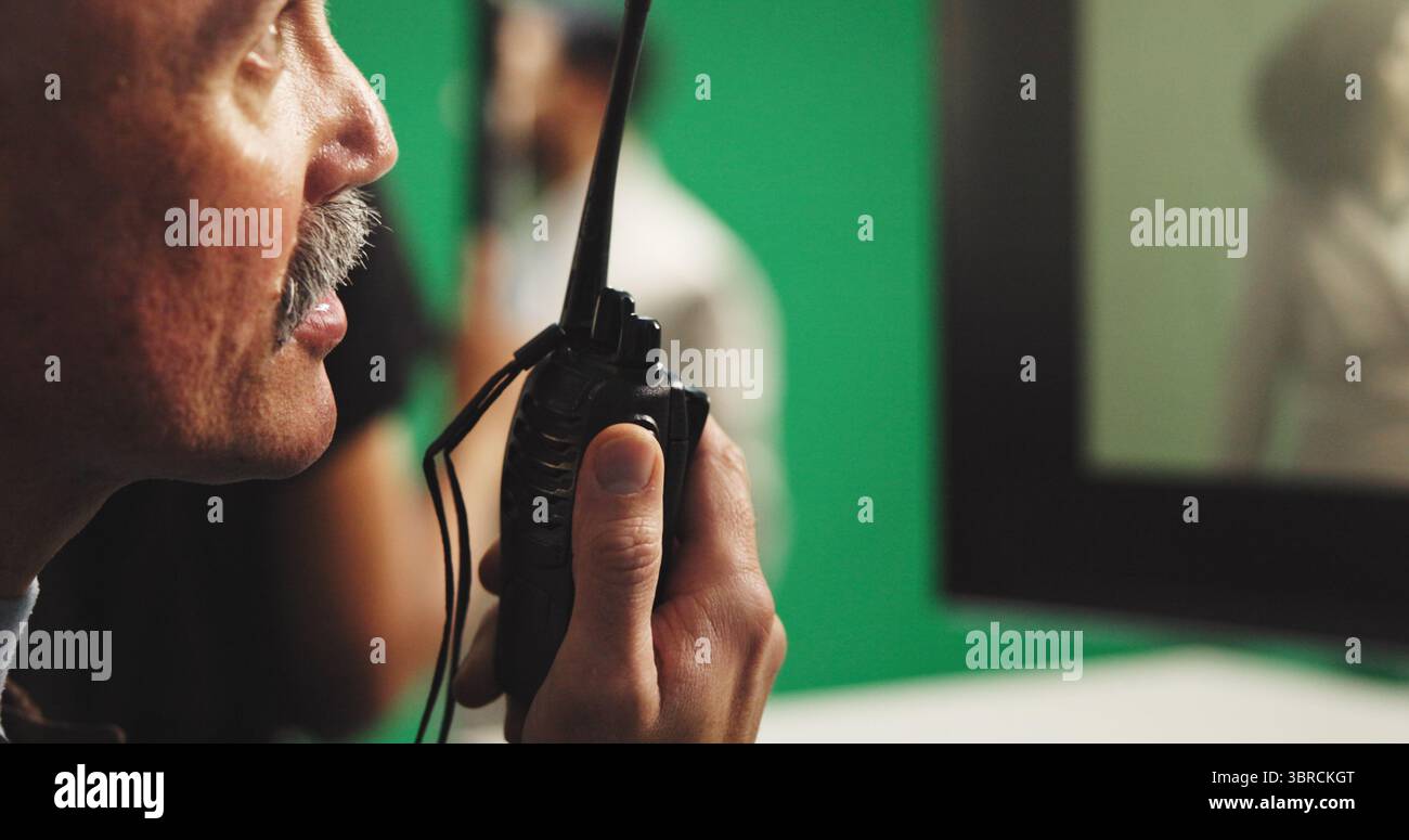 Director In Action Man, film director or radio with green screen for action, scene or ...