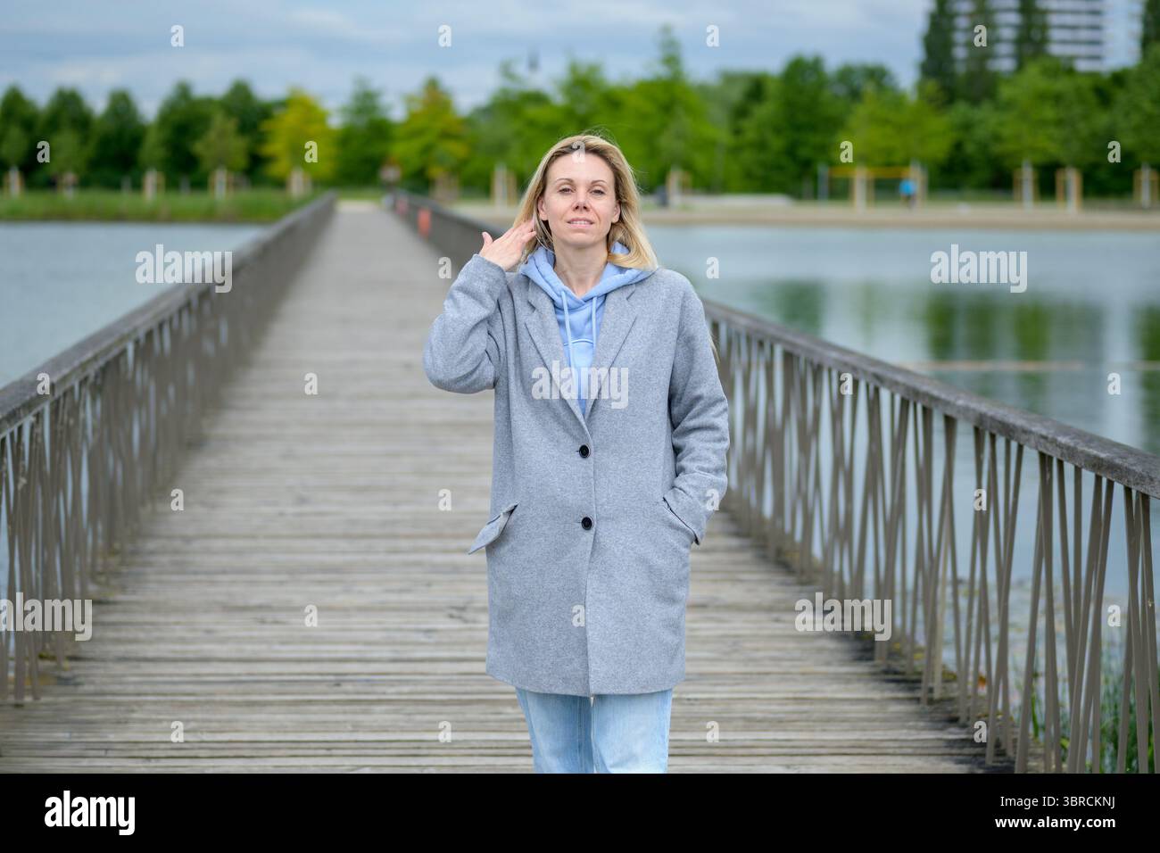 Self assured woman walks hi-res stock photography and images - Alamy