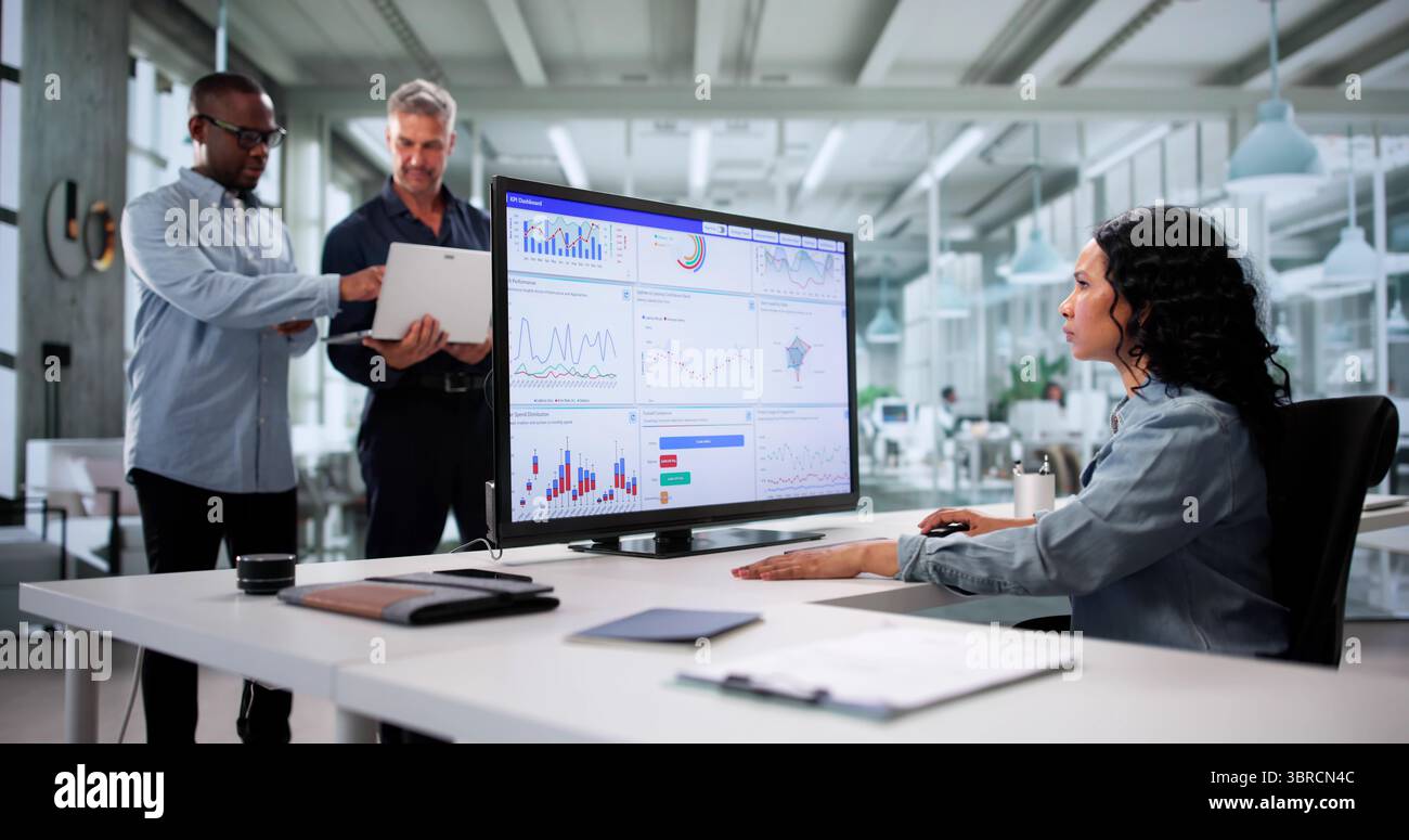 Analyzing Multicultural Data: A Diverse Team Predicts Business Performance Stock Photo