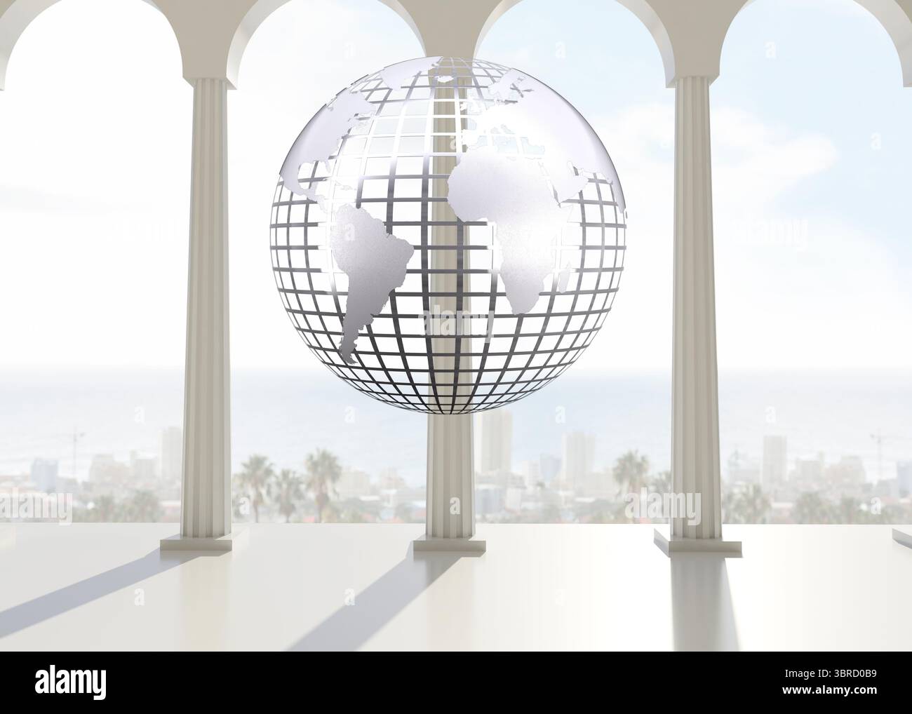 Silver globe floating in room Stock Photo