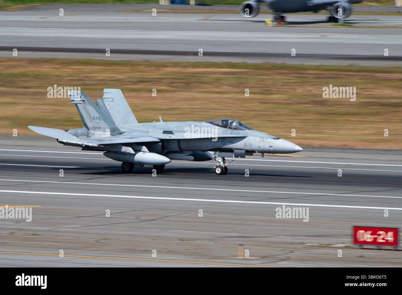 A North American Aerospace Defense Command CF-18 Hornet lands at Joint Base Elmendorf-Richardson, Alaska, July 8, 2025. Aircraft from the U.S. and Can Stock Photo