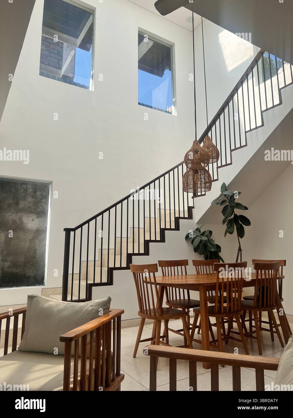 Modern minimalist living space with natural light, cozy textures, and timeless design for everyday inspiration - Smartphone Captured Stock Image