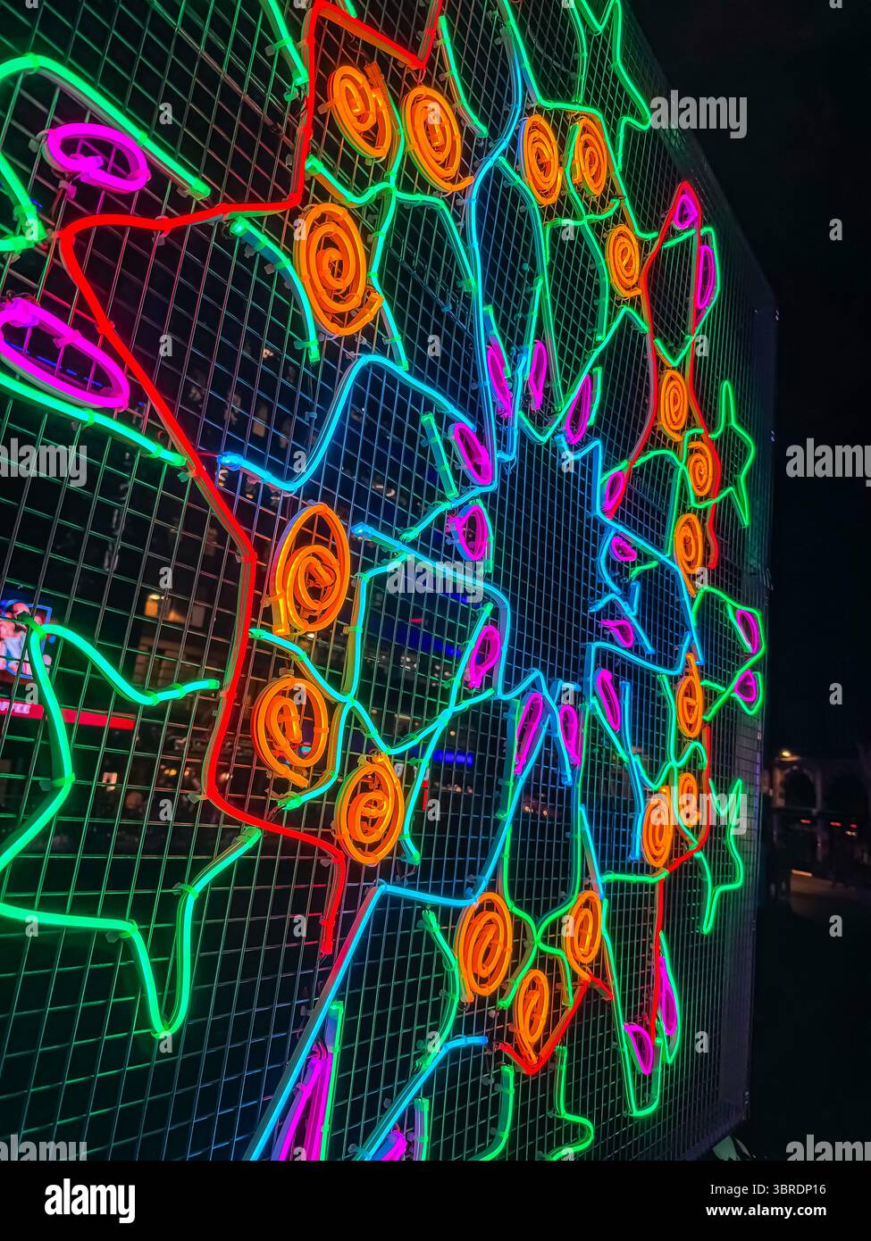 Art After Dark - There is no Darkness in the Garden of Light 2024.  Chila Kumari Singh Burman artwork in Leicester Square - Smartphone Captured Stock Image