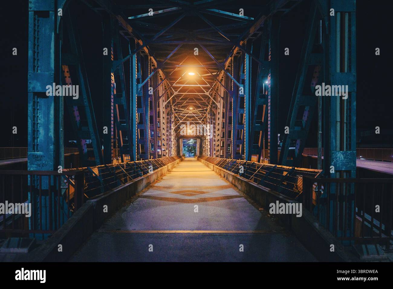 Old pedestrian bridge, night scene Stock Photo - Alamy