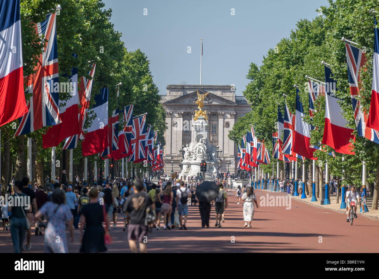 London, UK. British and French flags line The Mall in central London for the visit of the French President Emmanuel Macron from 8-10 July 2025. Buckingham Palace in the background. Stock Photo