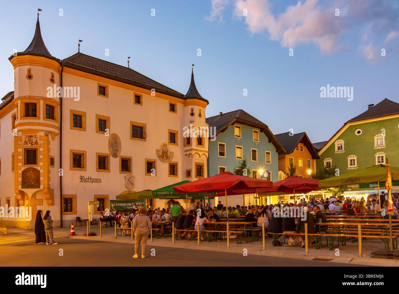 Tamsweg: square Marktplatz, Town Hall, music festival, people at beer garden tables in Lungau, Salzburg, Austria Stock Photo
