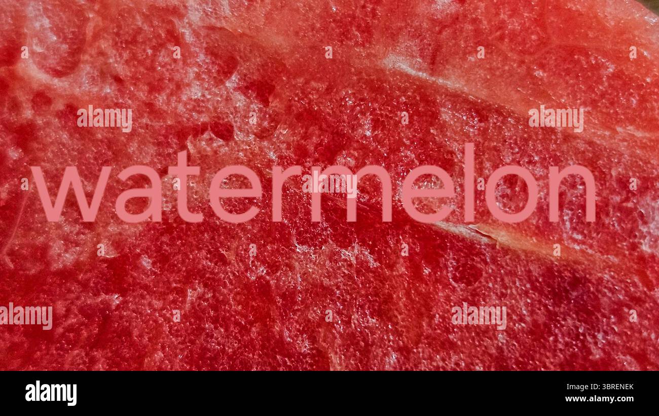 macro red texture of watermelon flesh, overlaid with the word “watermelon”. - Smartphone Captured Stock Image