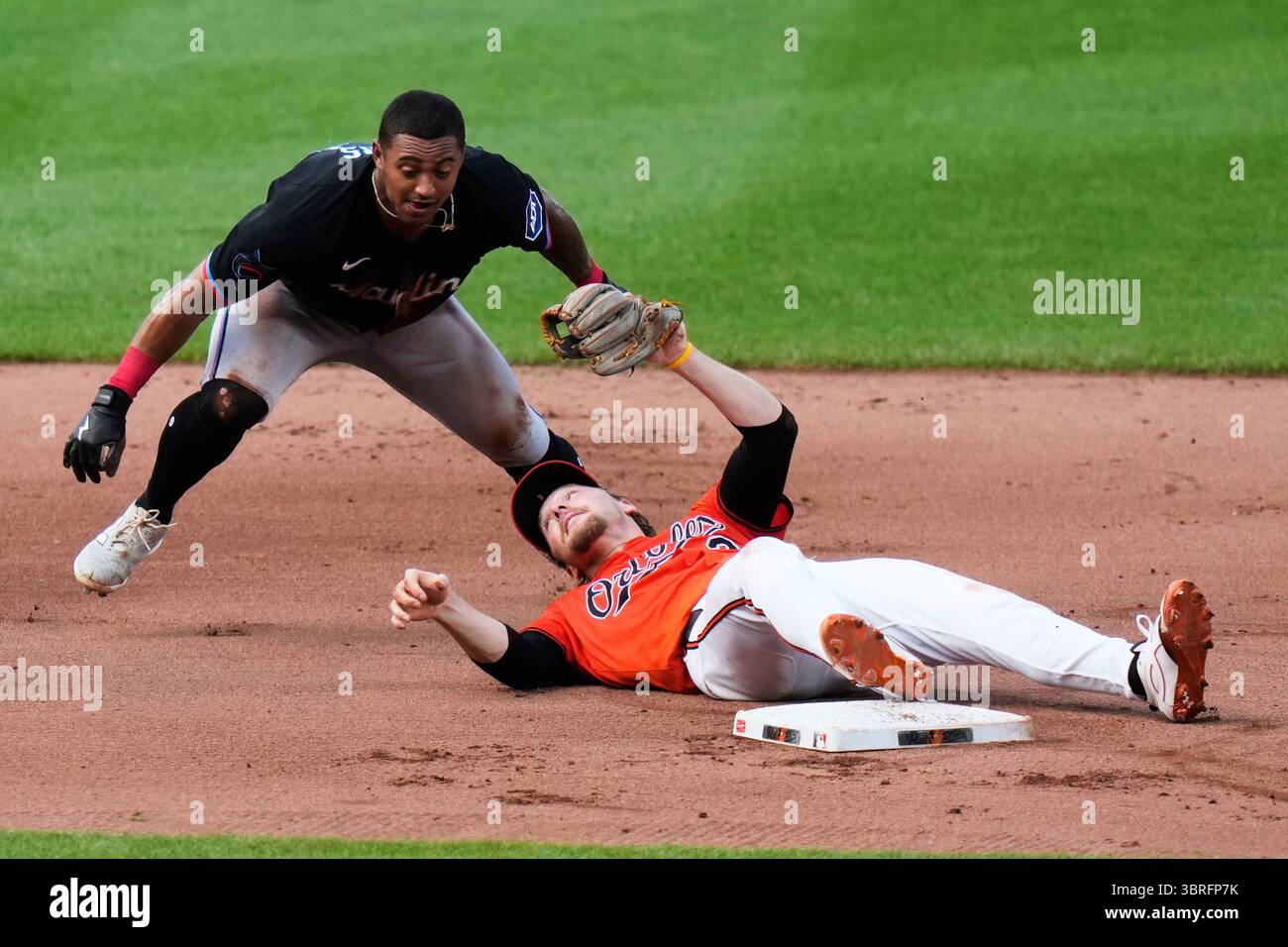 Miami Marlins' Dane Myers, left, is caught stealing second base by ...