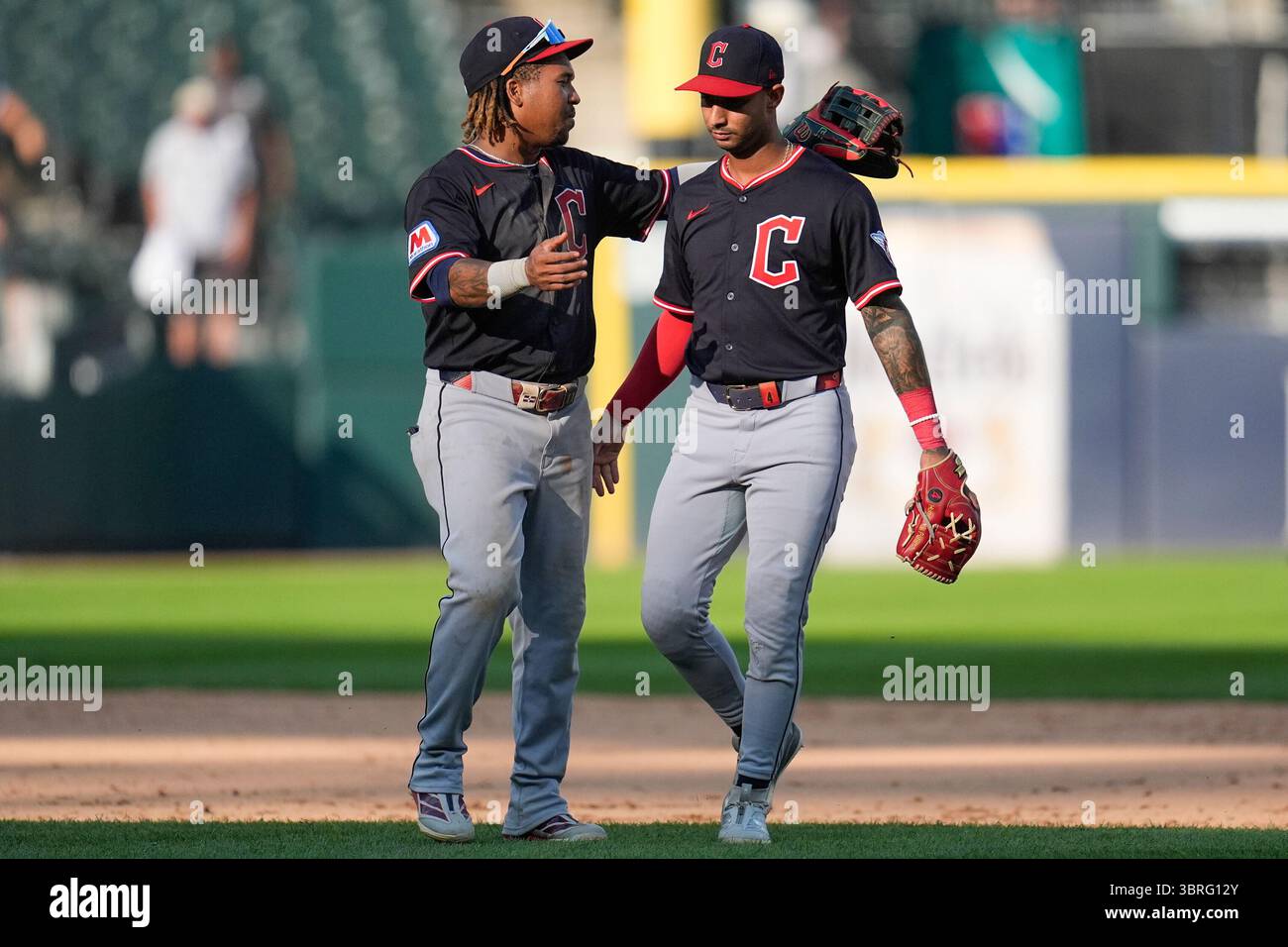 Braya Rocchio Cleveland Guardians third baseman José Ramírez, left, and shortstop ...