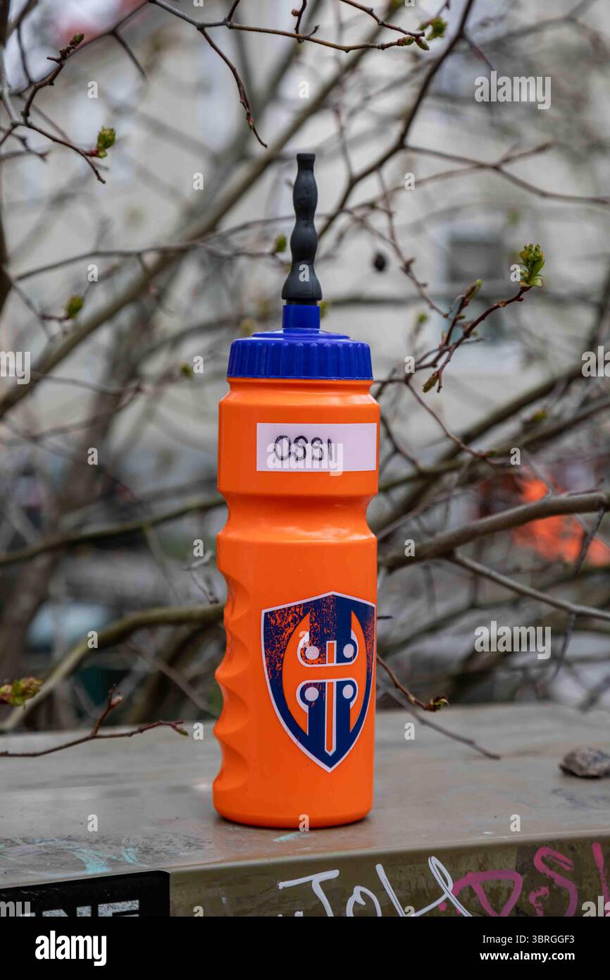 Tappara-themed water bottle with name Ossi at the top of Pispala stairs in Tampere, Finland Stock Photo