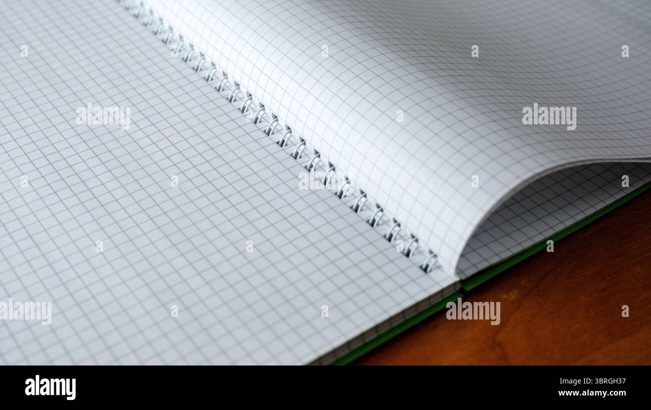 A spiral notebook lies open, ready for thoughts and ideas to emerge ...