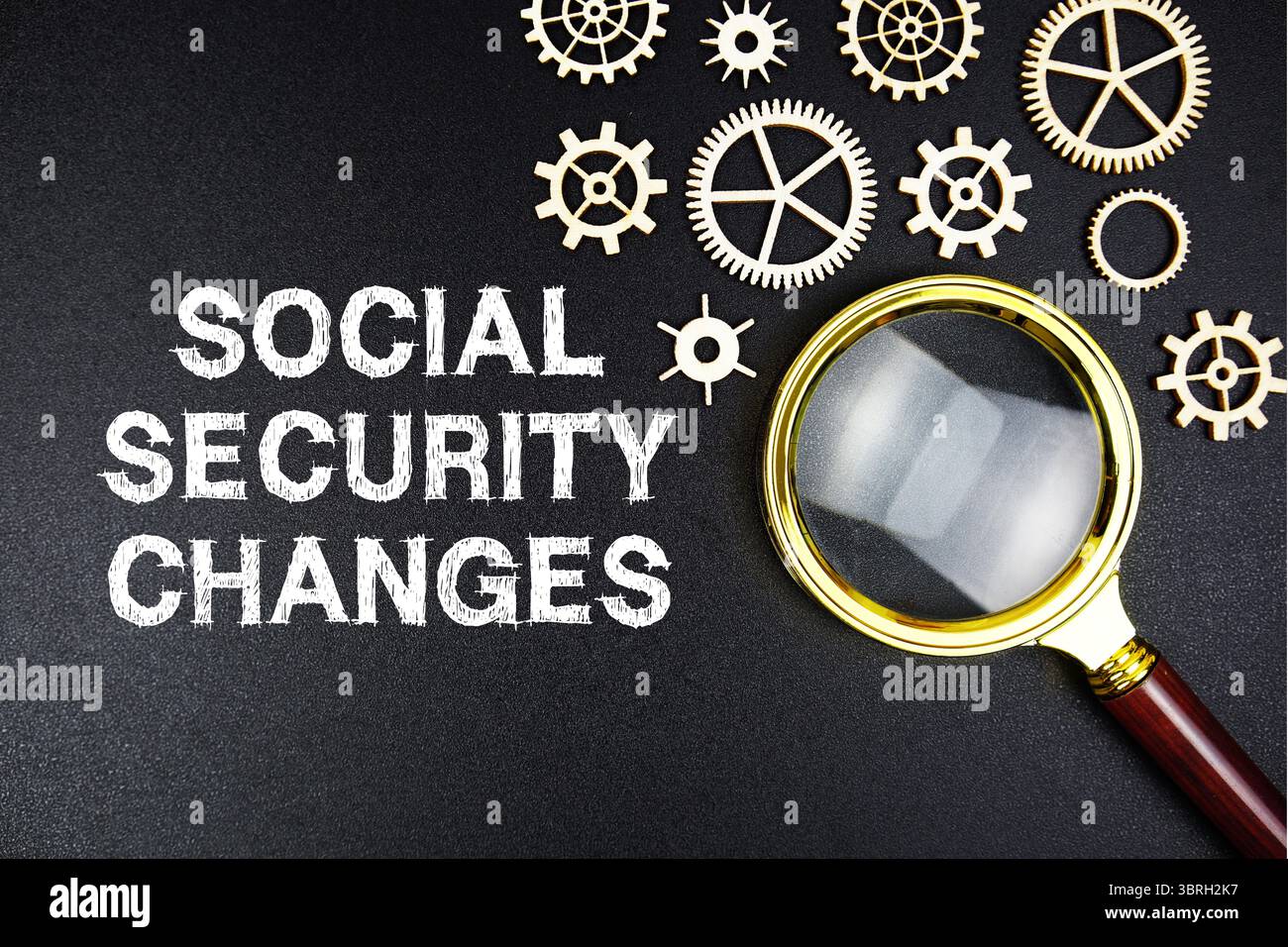 Social Security Changes text message with magnifying glass on black background Stock Photo