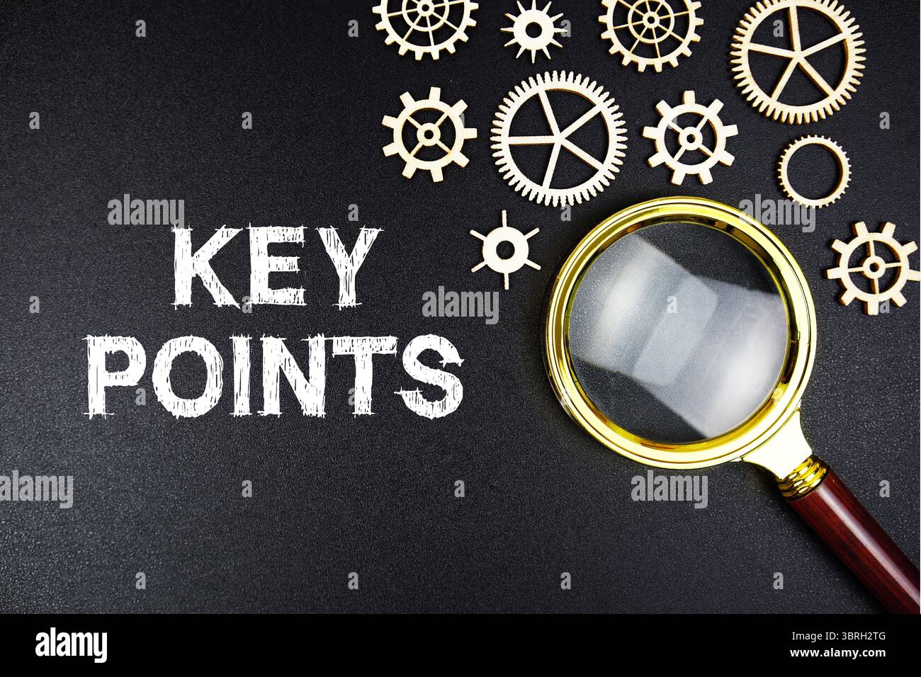 Key Points text message with magnifying glass on black background Stock Photo