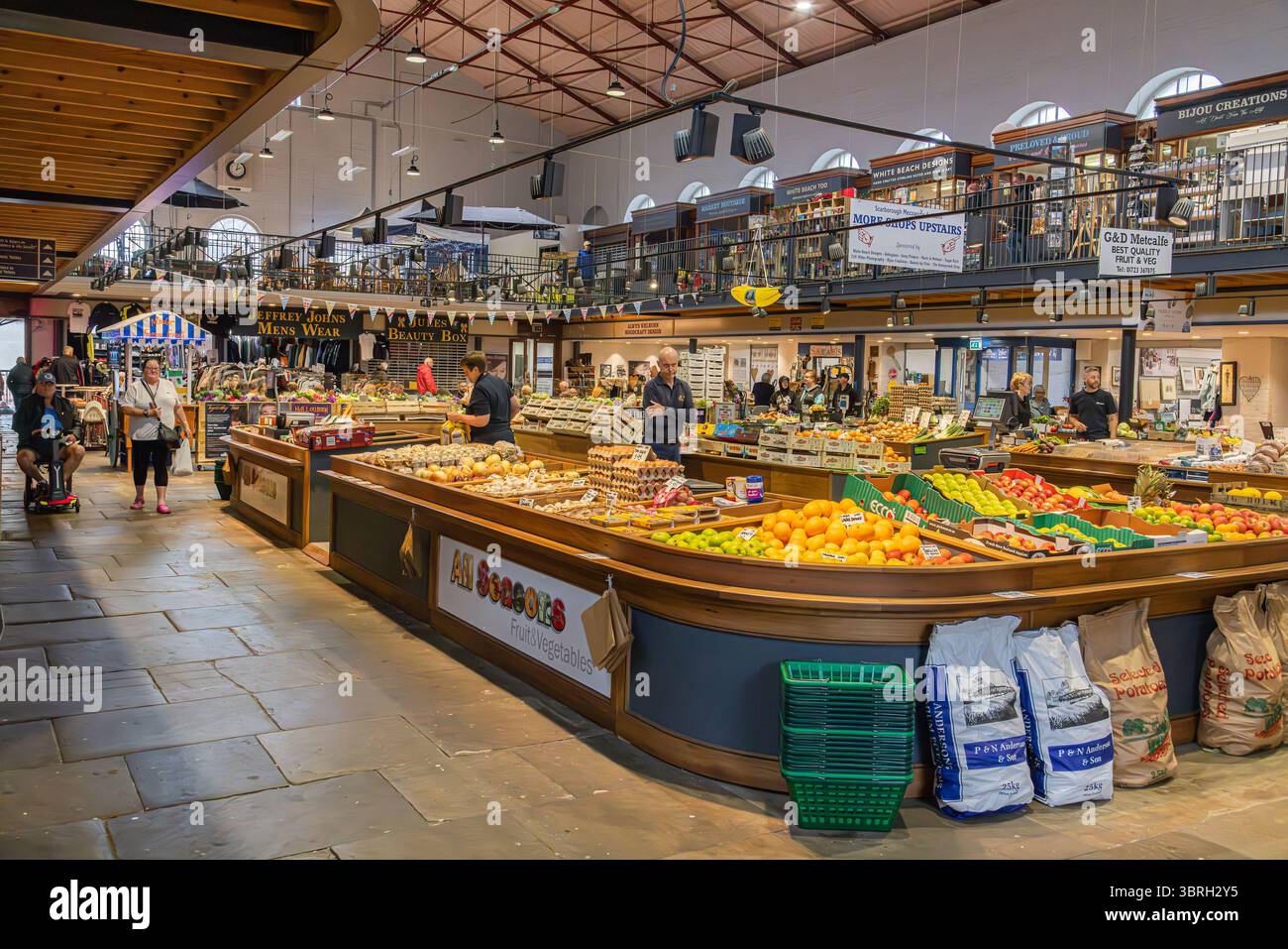 Scarborough Market Hall interior with shoppers browsing fresh produce