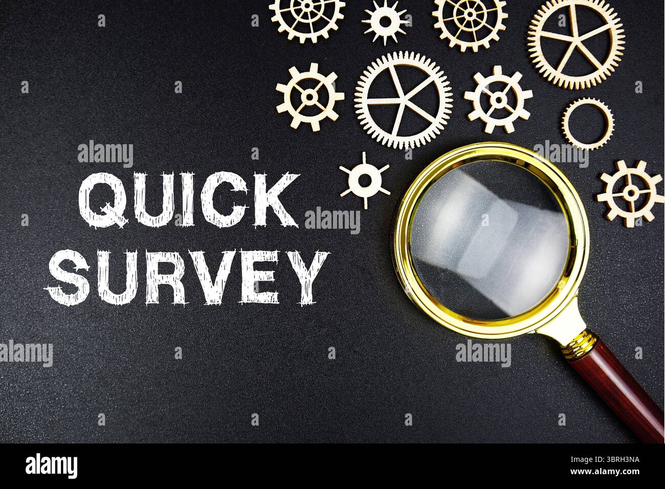 Quick Survey text message with magnifying glass on black background Stock Photo