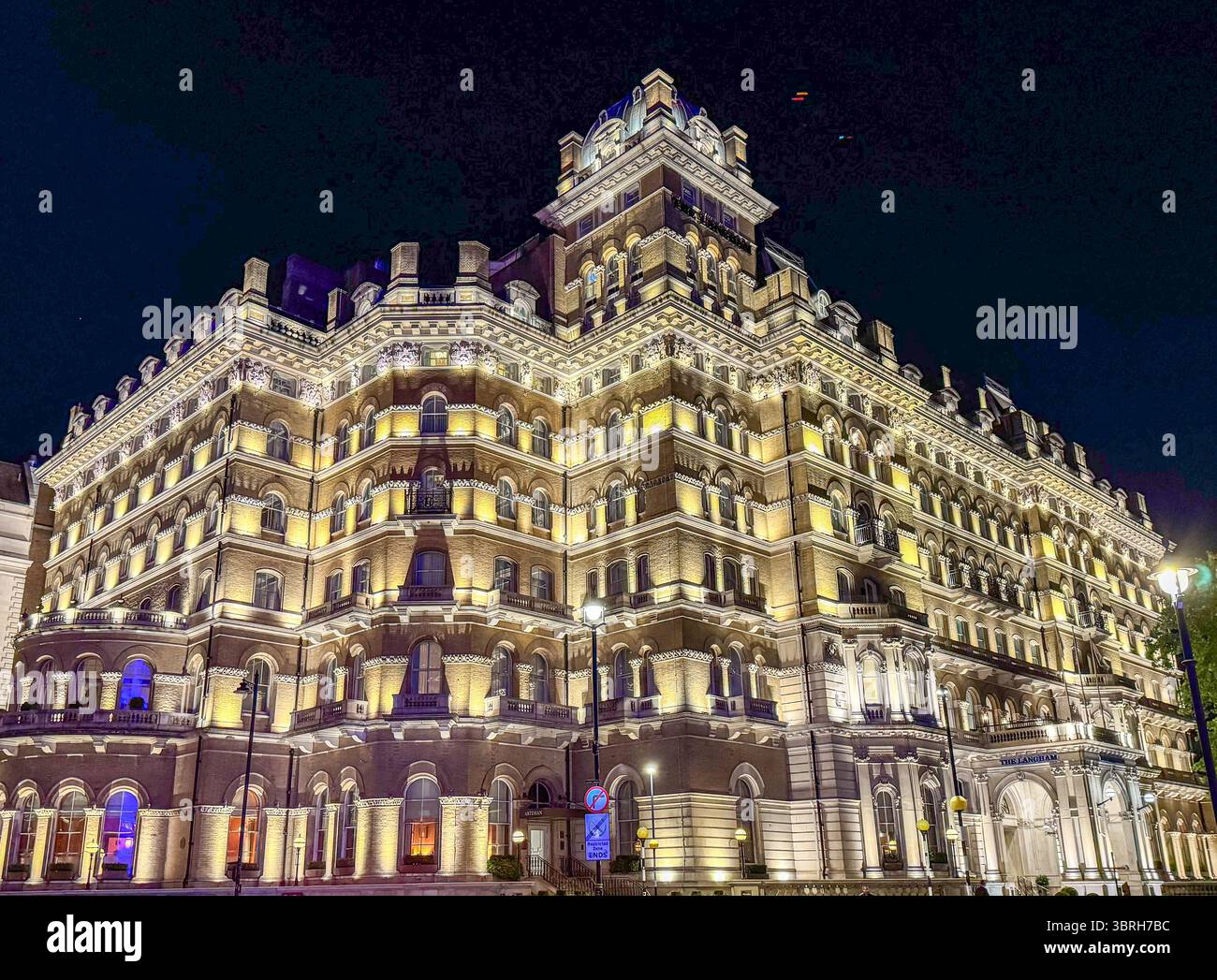 Night exterior shot of the 5-star The Langham Hotel in Central London ...